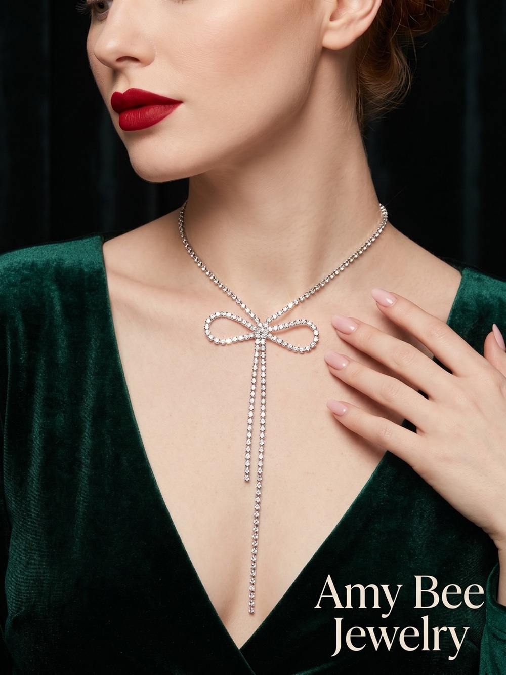 Silver Plated Rhinestone Bow Necklace. New.
